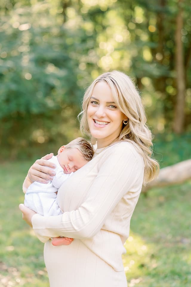 Pizzari newborn session, a mother holding her sleeping baby